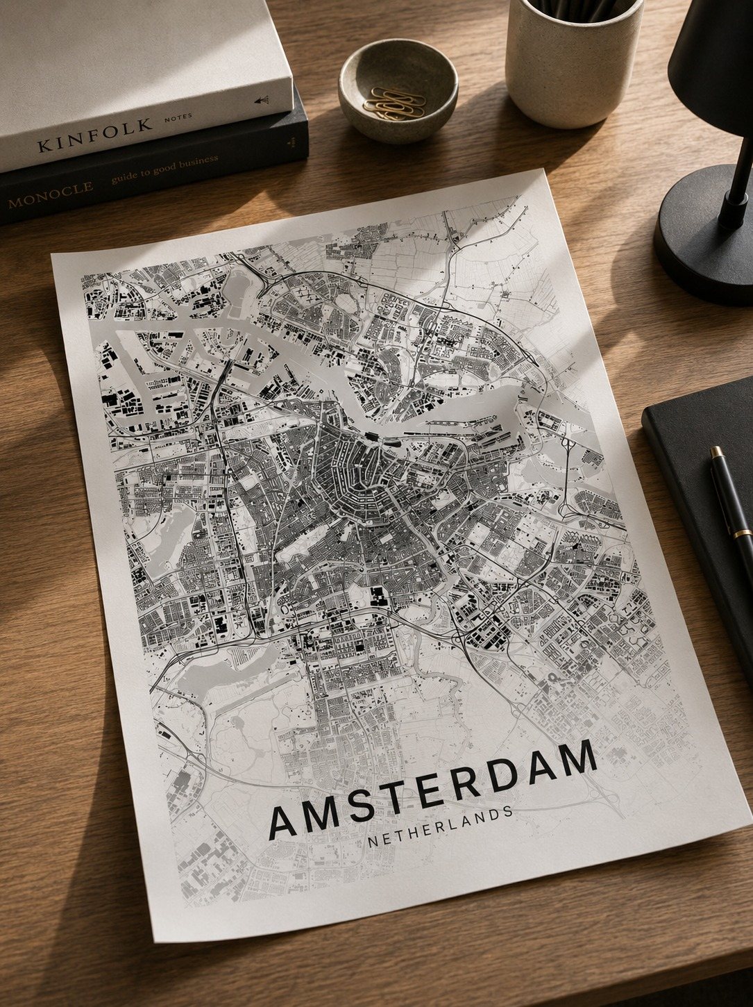 Amsterdam map print framed on a wall