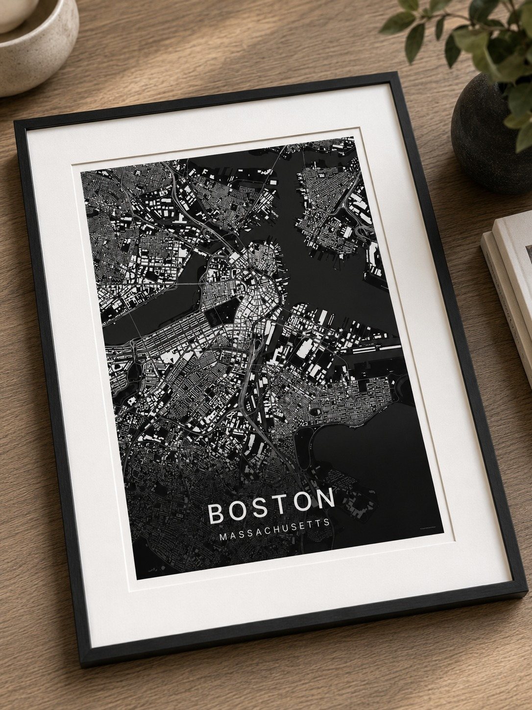 Boston map print framed on a wall