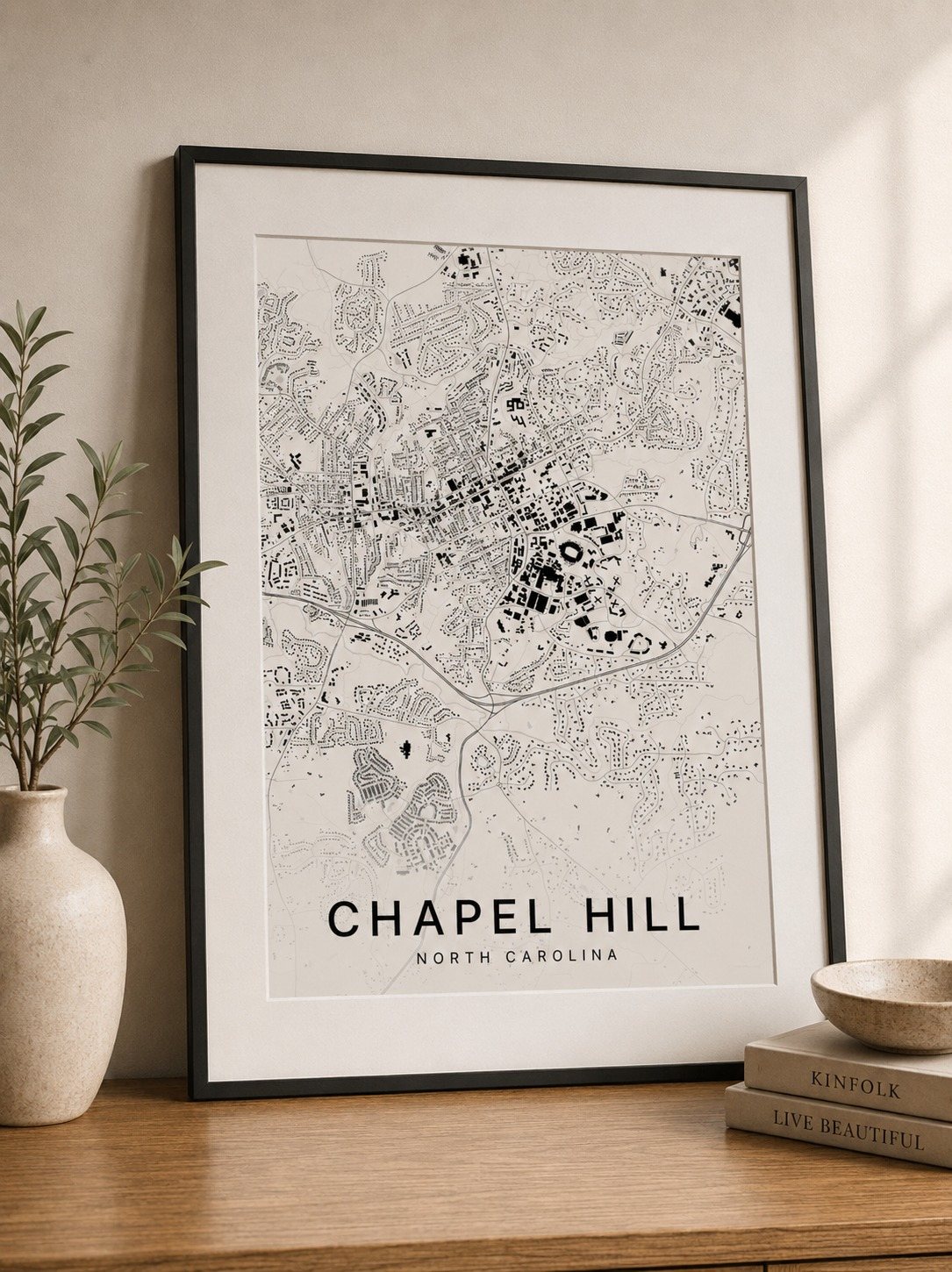 Chapel Hill map print framed on a wall