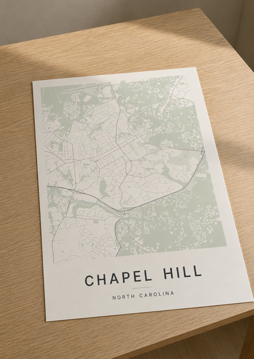 Chapel Hill map print framed on a wall