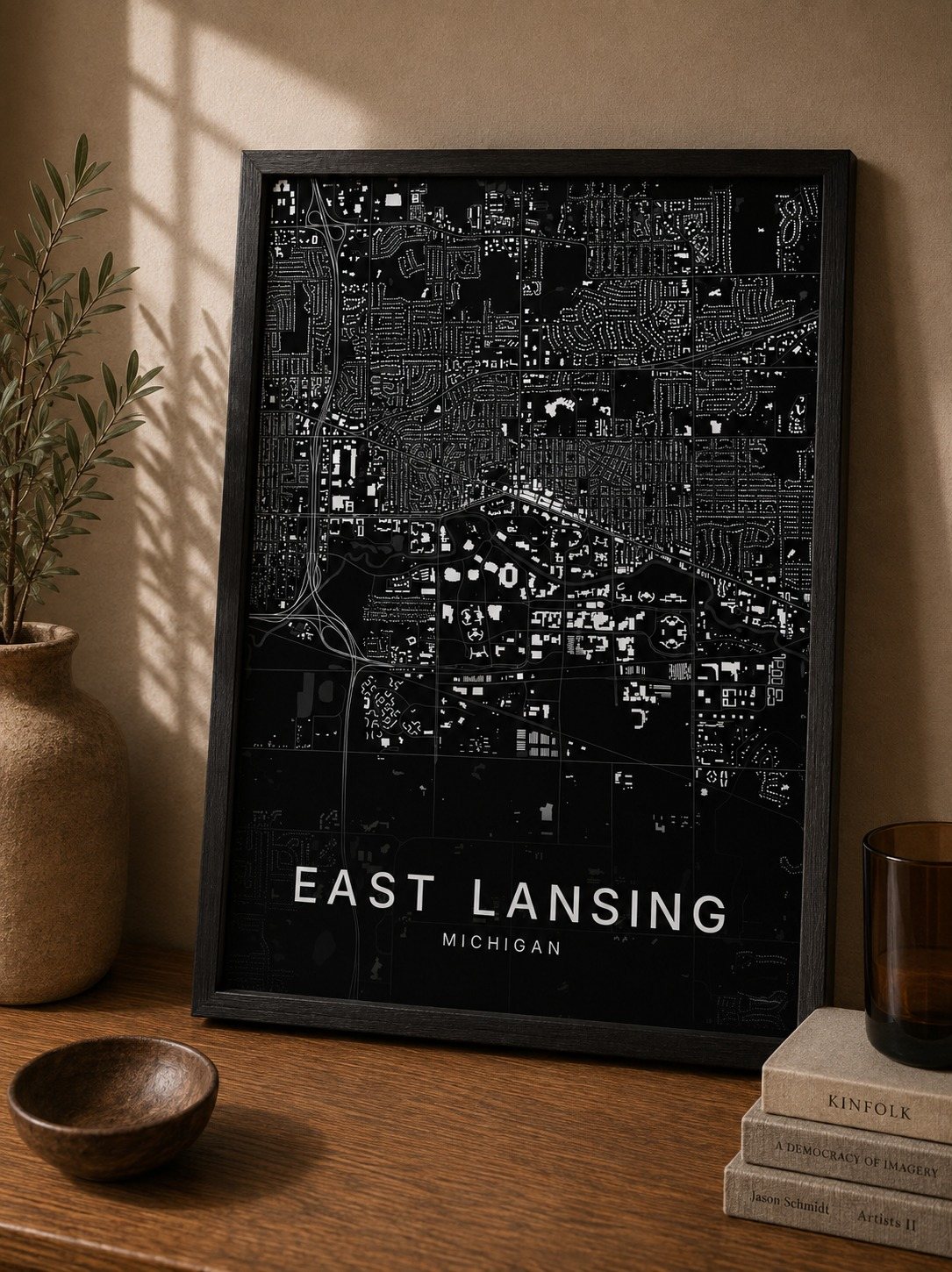 East Lansing map print framed on a wall