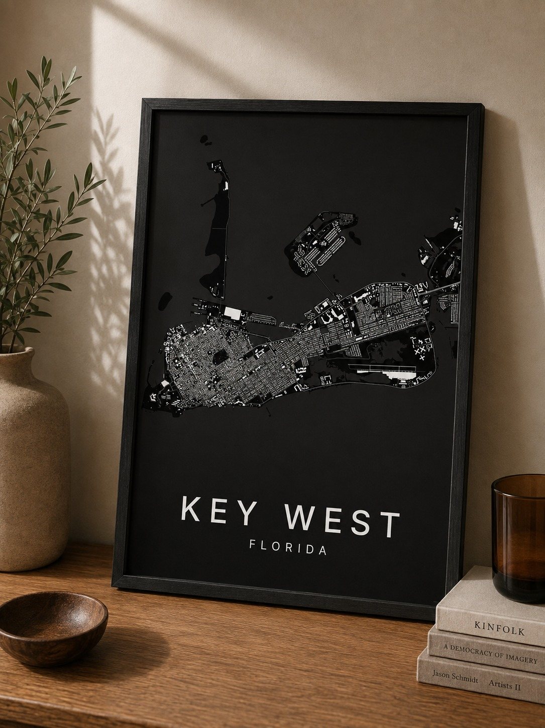 Key west map print framed on a wall