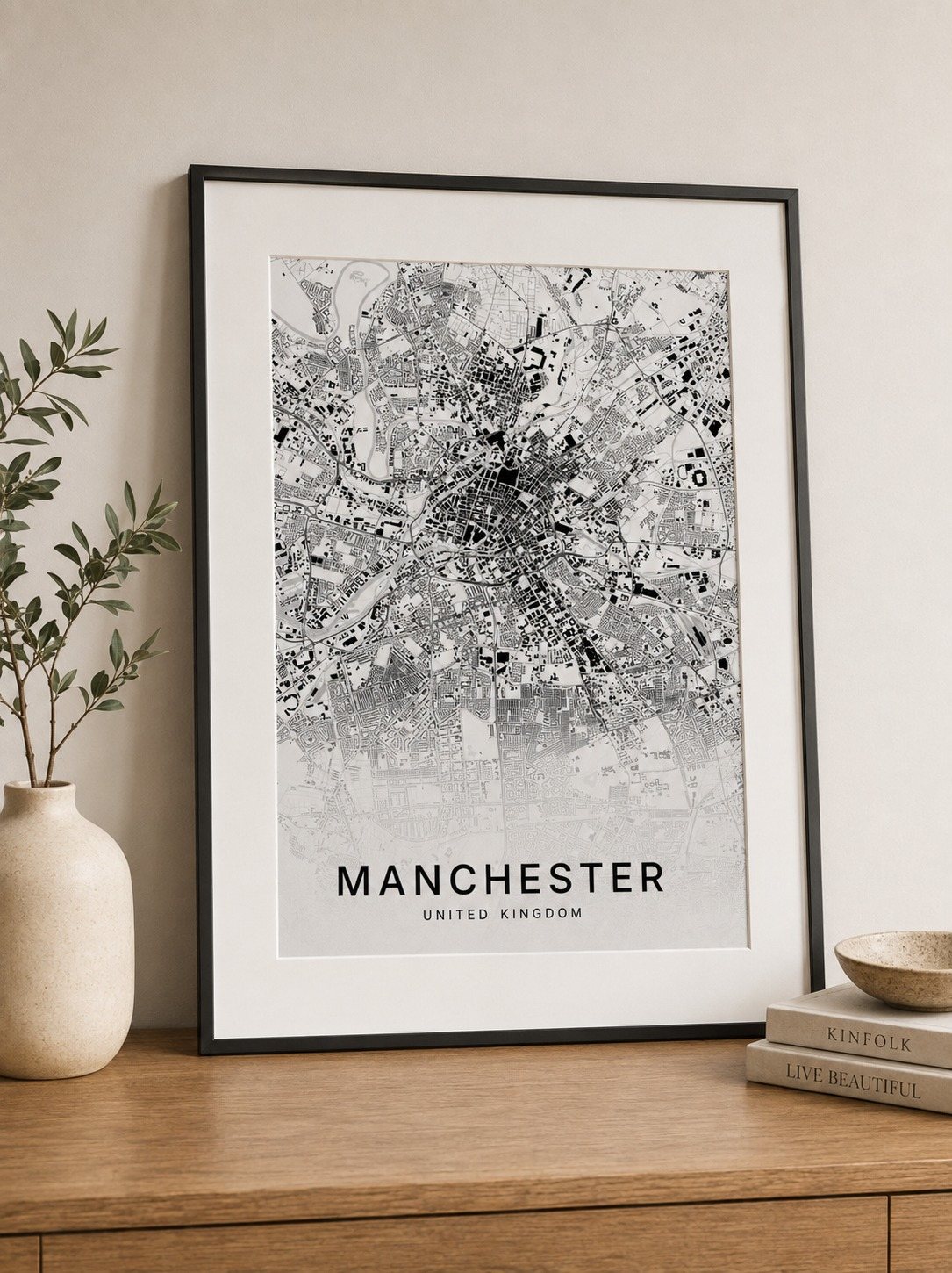 Manchester map print framed on a wall